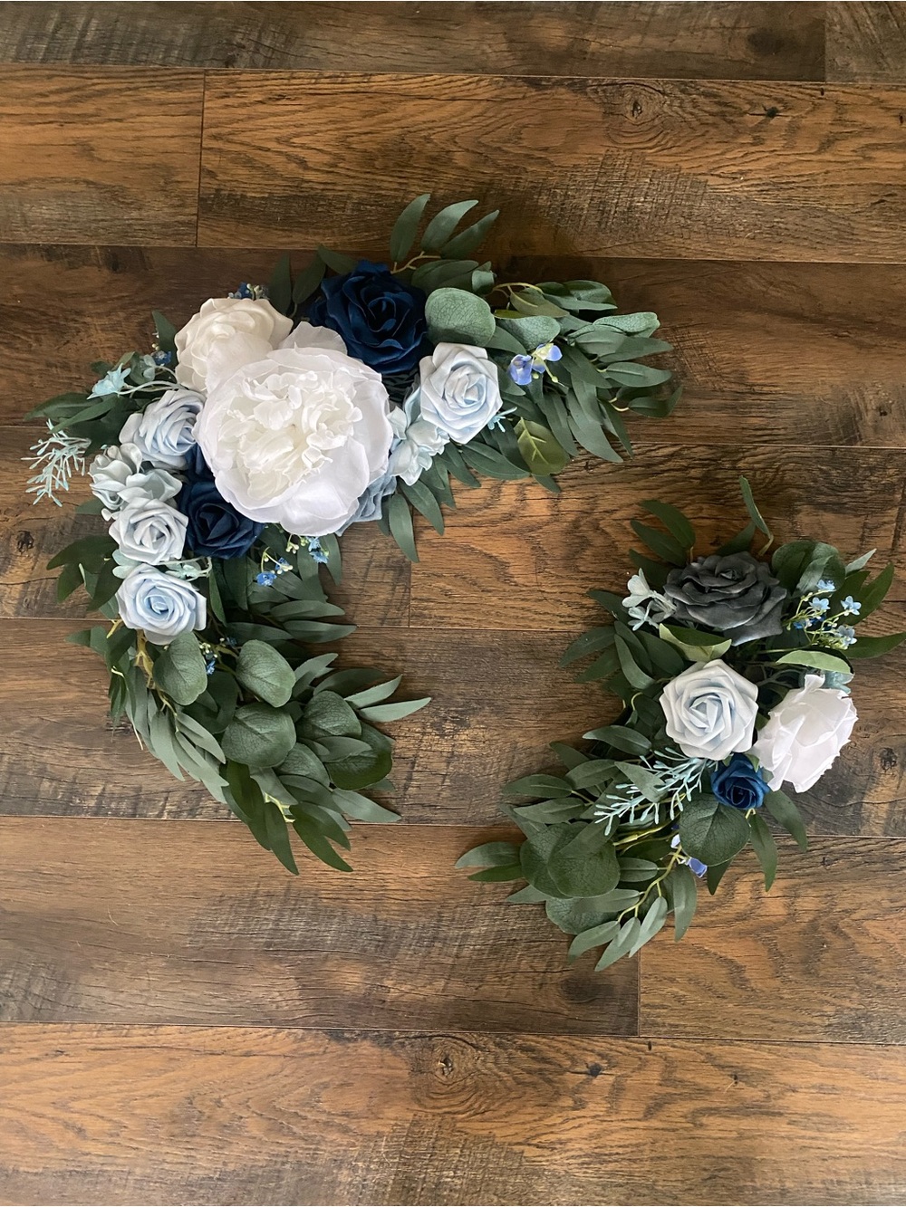 Ling’s Moment arch or swag wedding flowers in white and blue